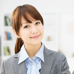 Beautiful young businesswoman working in office